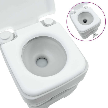 Detail van het grijze en witte vidaXL campingtoilet met de spoelknop en toiletopening.