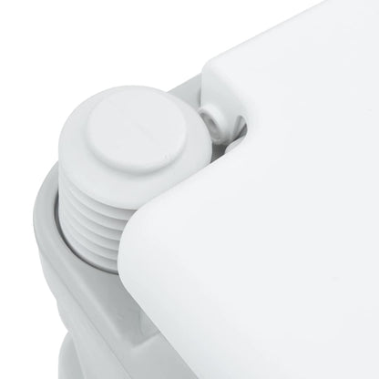 Detail van de bellows-pomp van het vidaXL campingtoilet in grijs en wit.