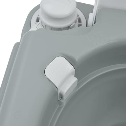 Detail van de T-Type spoeldop van het vidaXL campingtoilet in grijs en wit.