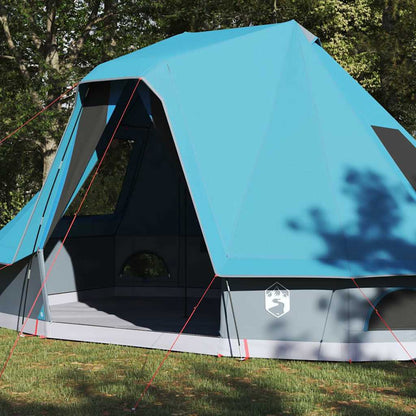 Zijaanzicht van de vidaXL Tipi Tent in blauw, met open ingang en stevige bevestigingen.