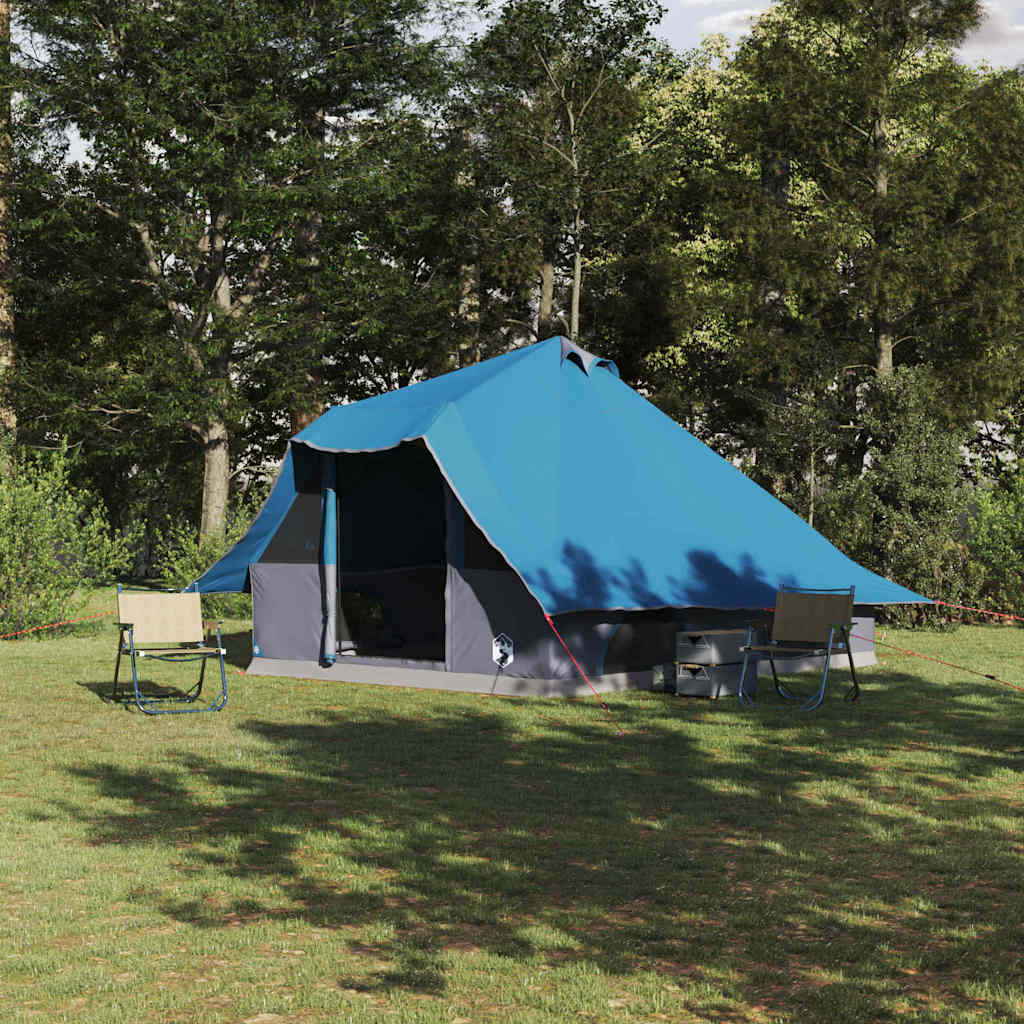 Blauwe vidaXL Tipi Tent in een groene omgeving, geschikt voor gezinnen tot 8 personen.