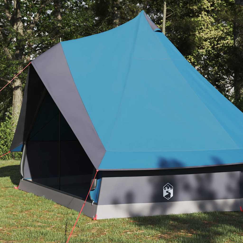 Zijaanzicht van de vidaXL Tipi Tent in blauw met grijze details, geplaatst op gras.