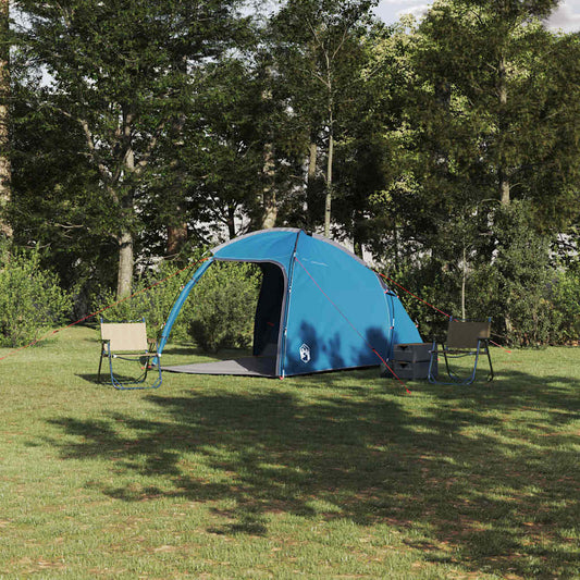 Blauwe vidaXL Huisje Tent met dak, geplaatst op gras met twee stoelen.