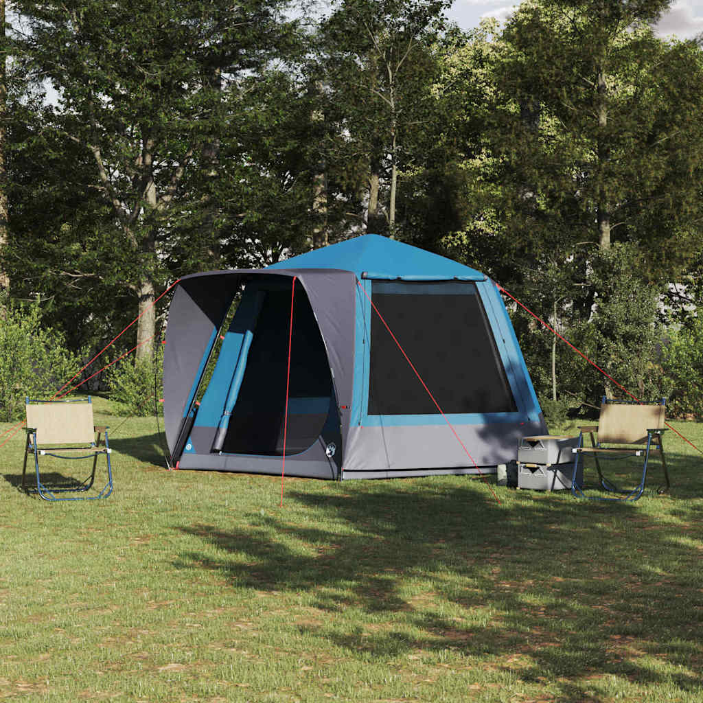 Blauwe vidaXL campingtent huisje met dak, geplaatst in een groene omgeving.