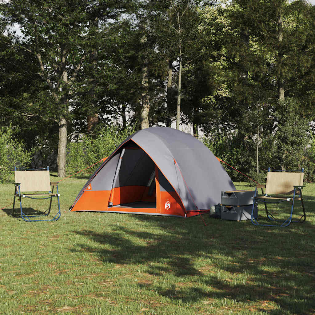 Grijze en oranje vidaXL campingtent met een ruime ingang, geplaatst op gras.