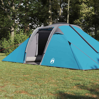 Zijaanzicht van de vidaXL Tunnel tent in blauw met open ingang en groene omgeving.