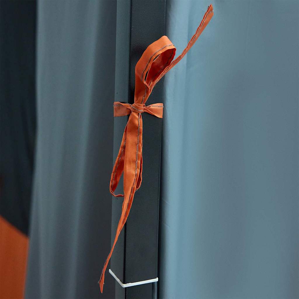 Detail van de oranje strik aan de grijze binnentent van vidaXL.