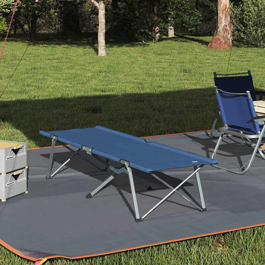 Opvouwbaar campingbed vidaXL in blauw, geplaatst op gras met campingstoelen.