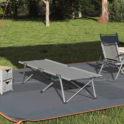 Opvouwbaar vidaXL camping bed in grijs, geplaatst op een groene grasmat.