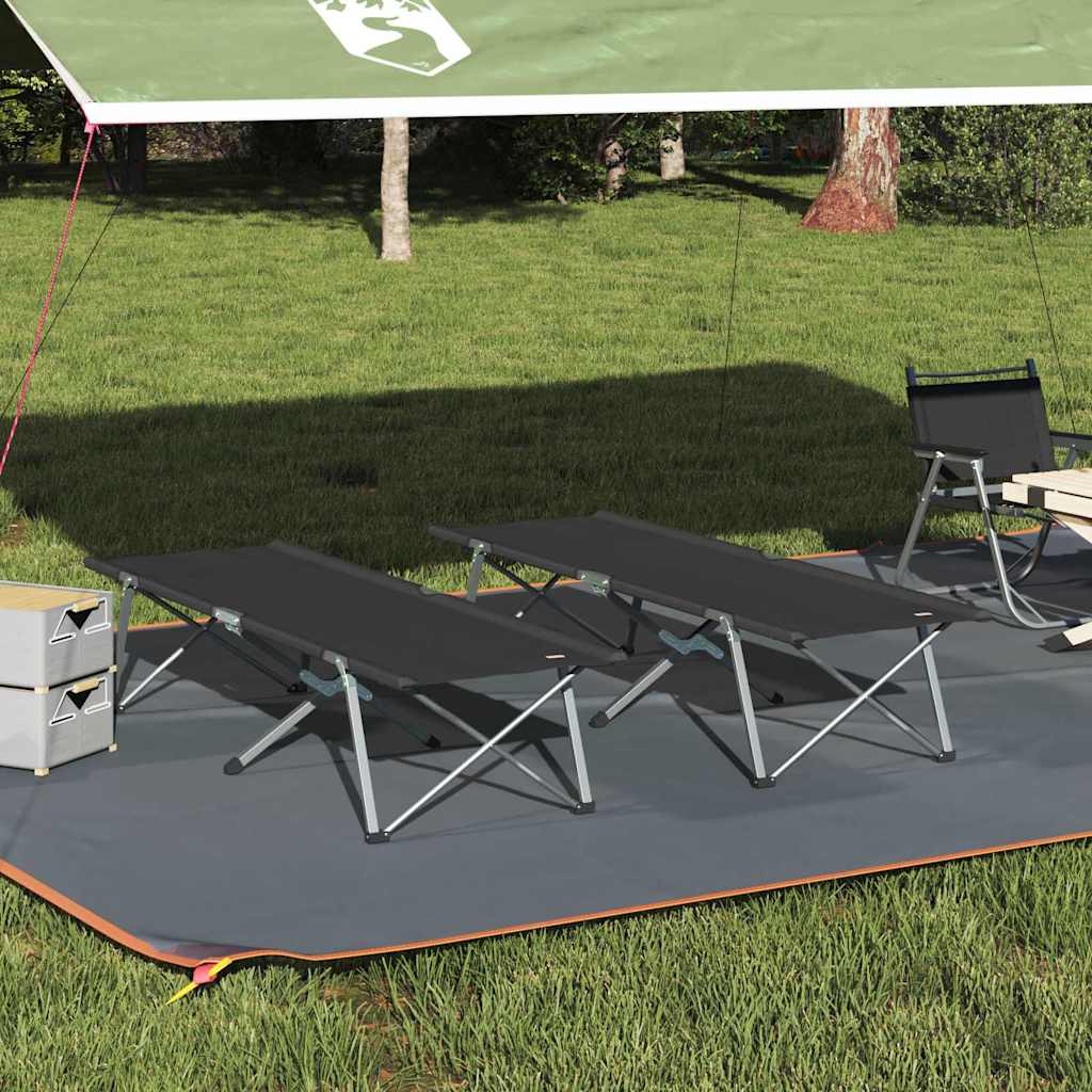 Opvouwbaar vidaXL camping bed in zwart, geplaatst onder een tentdoek op gras.