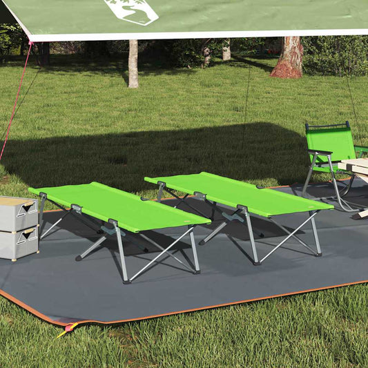 Opvouwbaar vidaXL Camping Bed in groen, geplaatst onder een luifel op gras.