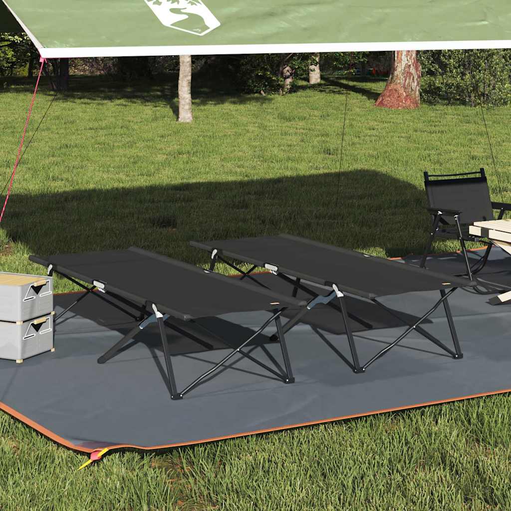 Zwart opvouwbaar campingbed van vidaXL, geplaatst onder een tentdoek op gras.