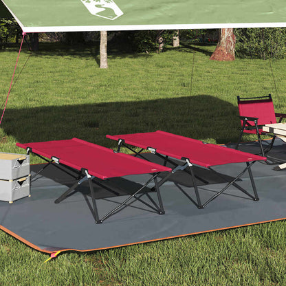 Rode vidaXL opvouwbare camping bedden, twee stuks onder een luifel op gras.