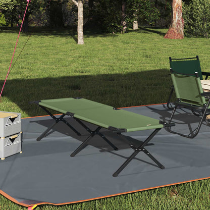 Opvouwbaar vidaXL campingbed in groen, geplaatst op een grijze ondergrond in een buitenomgeving.
