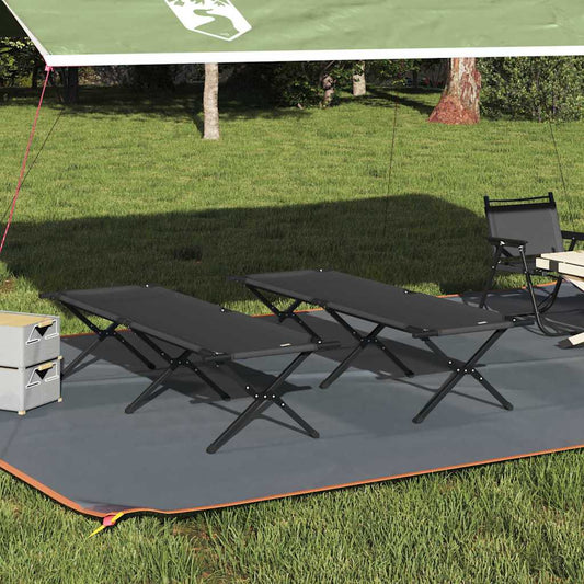 Zwart vidaXL opvouwbaar campingbed met stevig stalen frame, geplaatst op gras.