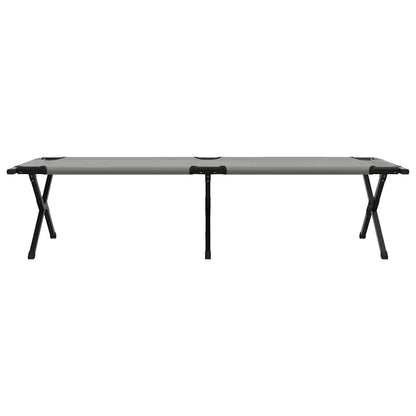 Zijaanzicht van het vidaXL opvouwbare camping bed in grijs met stevig stalen frame.