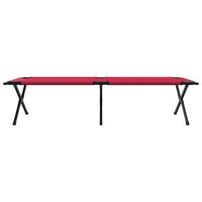 Zijaanzicht van het vidaXL opvouwbare camping bed in rood, met stevige zwarte poten.