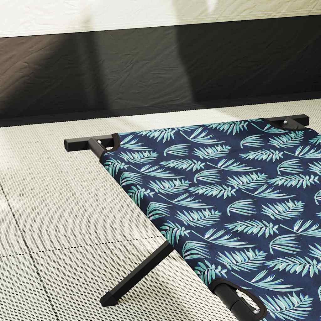 Detail van het opvouwbare campingbed van vidaXL met een bladerenpatroon op de Oxford stof.