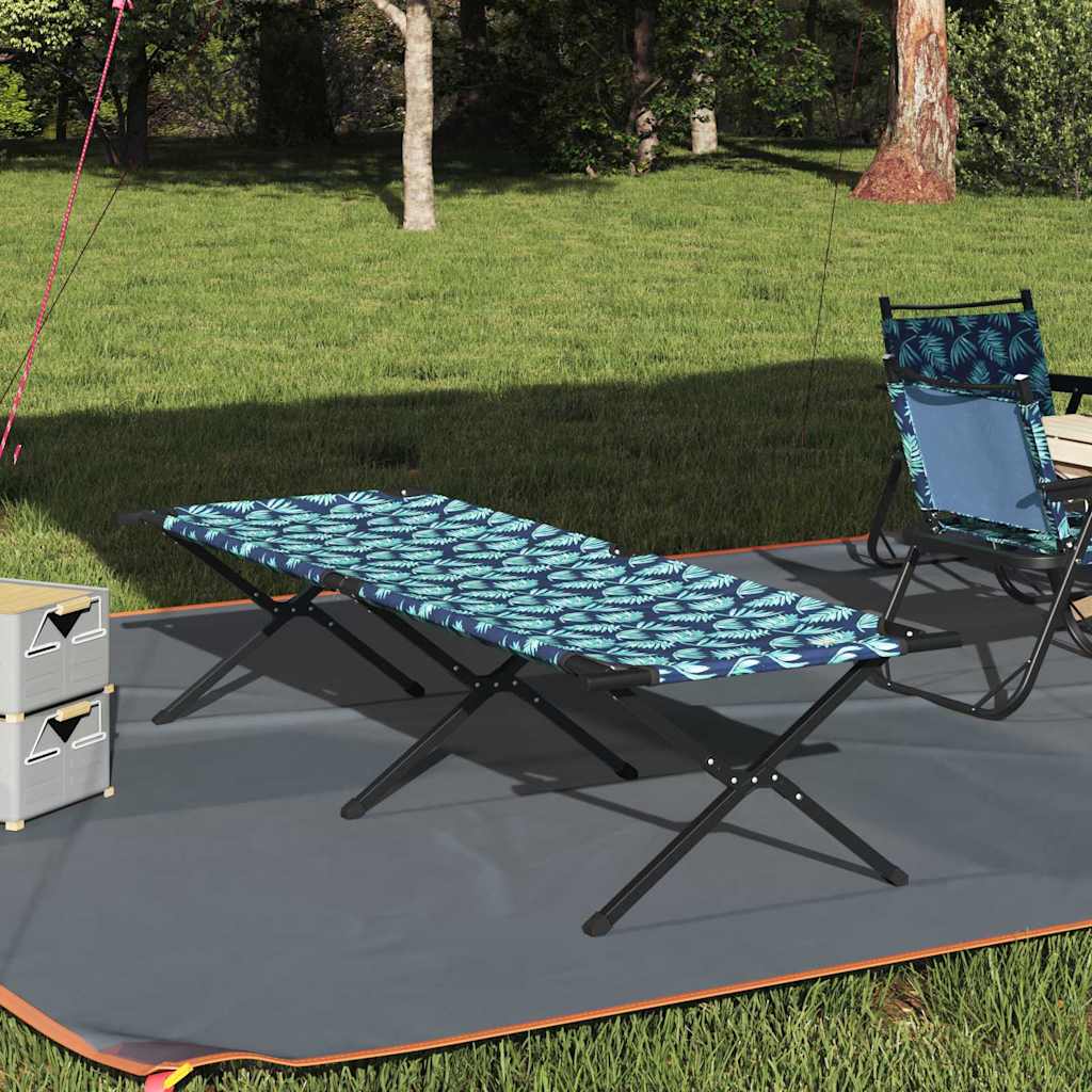 Opvouwbaar campingbed van vidaXL met een blauw patroon, geplaatst op gras bij een tent.