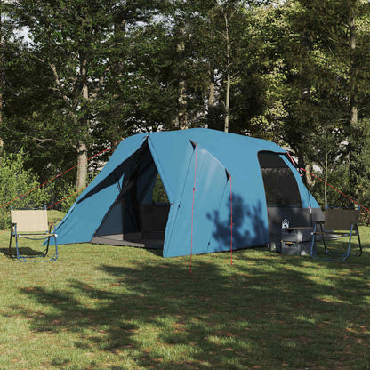 Blauwe vidaXL Dome Tent 6-persoons in een groene omgeving met zitgelegenheid.