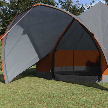 Detail van de openstaande ingang van de vidaXL Teepee Tent in grijs en oranje.