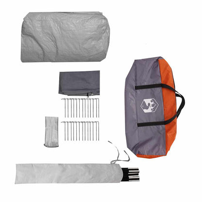 Detail van de grijze en oranje tentaccessoires, inclusief stokken, haringen en opbergtas.