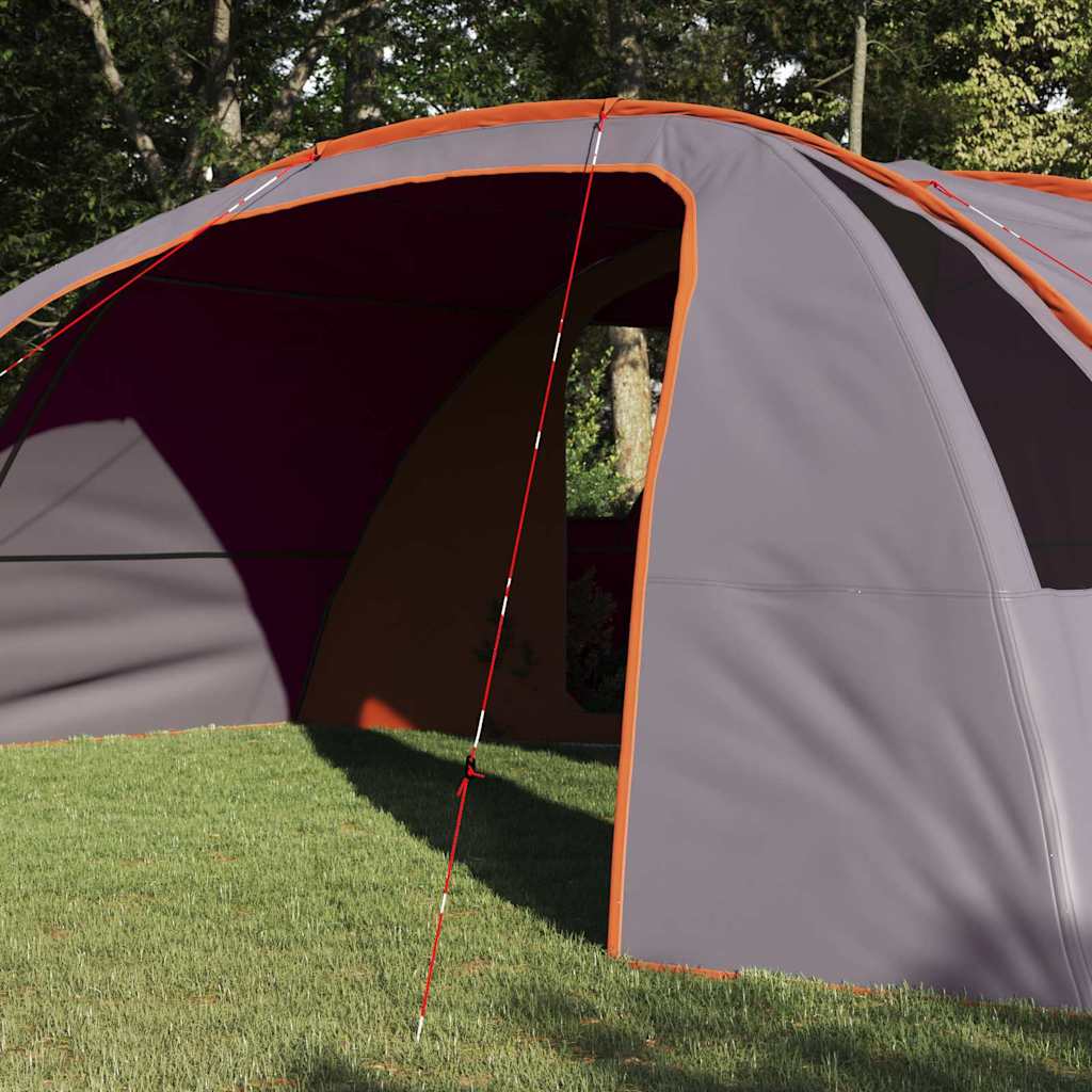 Detail van de grijze en oranje vidaXL tunnel tent met een zijaanzicht en ingangsopening.