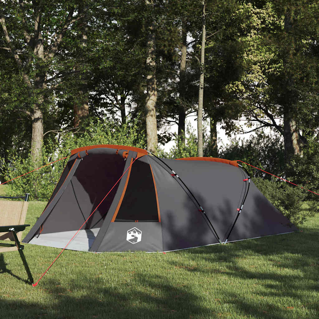 vidaXL Tunnel Tent 3-Person in grijs en oranje, geplaatst op gras met bomen op de achtergrond.
