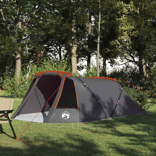 vidaXL Tunnel Tent 3-Person in grijs en oranje, geplaatst op gras met bomen op de achtergrond.