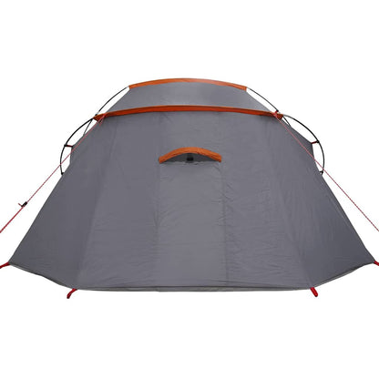 Zijaanzicht van de vidaXL Tunnel Tent in grijs met oranje details.