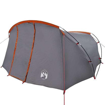 Detail van de grijs-oranje vidaXL Tunnel Tent met een aerodynamisch ontwerp en stevige ritsen.