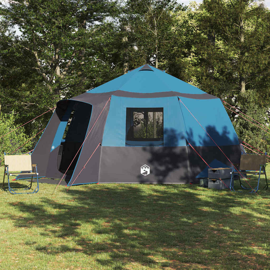 Blauwe en grijze vidaXL Cabin Tent voor 12 personen, opgesteld in een groene omgeving.
