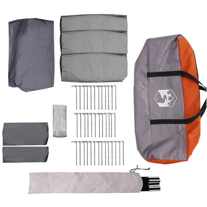 Detail van de grijs-oranje tentaccessoires, inclusief stokken en haringen van vidaXL.