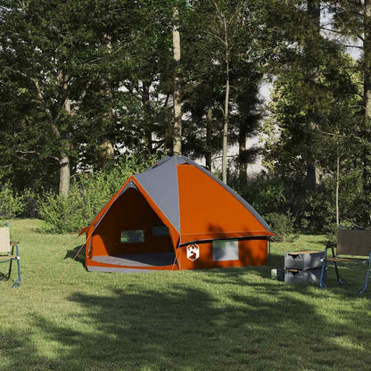 Grijze en oranje vidaXL Teepee Tent voor vier personen in een groene omgeving.