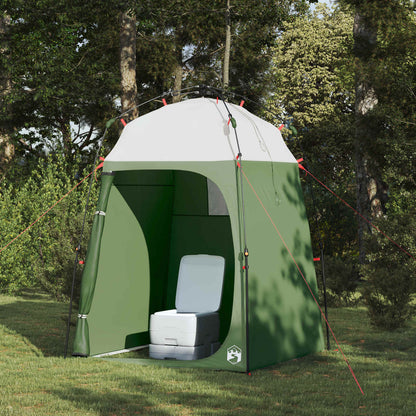 Detail van de vidaXL Instant Tent met een toiletstoel binnenin, groene buitenkant en witte bovenkant.
