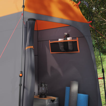 Detail van de grijs-oranje vidaXL tent met opbergplank en accessoires binnenin.