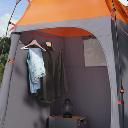 Detail van de binnenkant van de vidaXL Instant Tent met kledinghangers en een lamp.