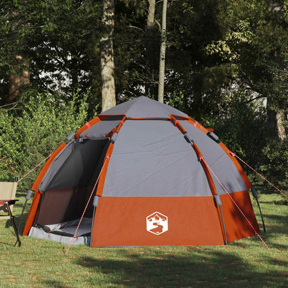 vidaXL Instant tent voor 4 personen in grijs en oranje, snel op te zetten in de natuur.
