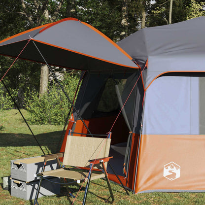 Detail van de vidaXL Instant tent met regenhuif en een opklapbare stoel.