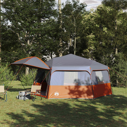 vidaXL Instant tent voor 12 personen met regenhuif, opgesteld in een groene omgeving.