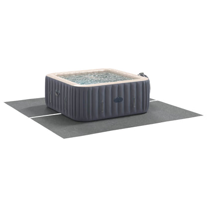 Detail van het vidaXL zwembad grondzeil in lichtgrijs, onder een opblaasbaar jacuzzi.