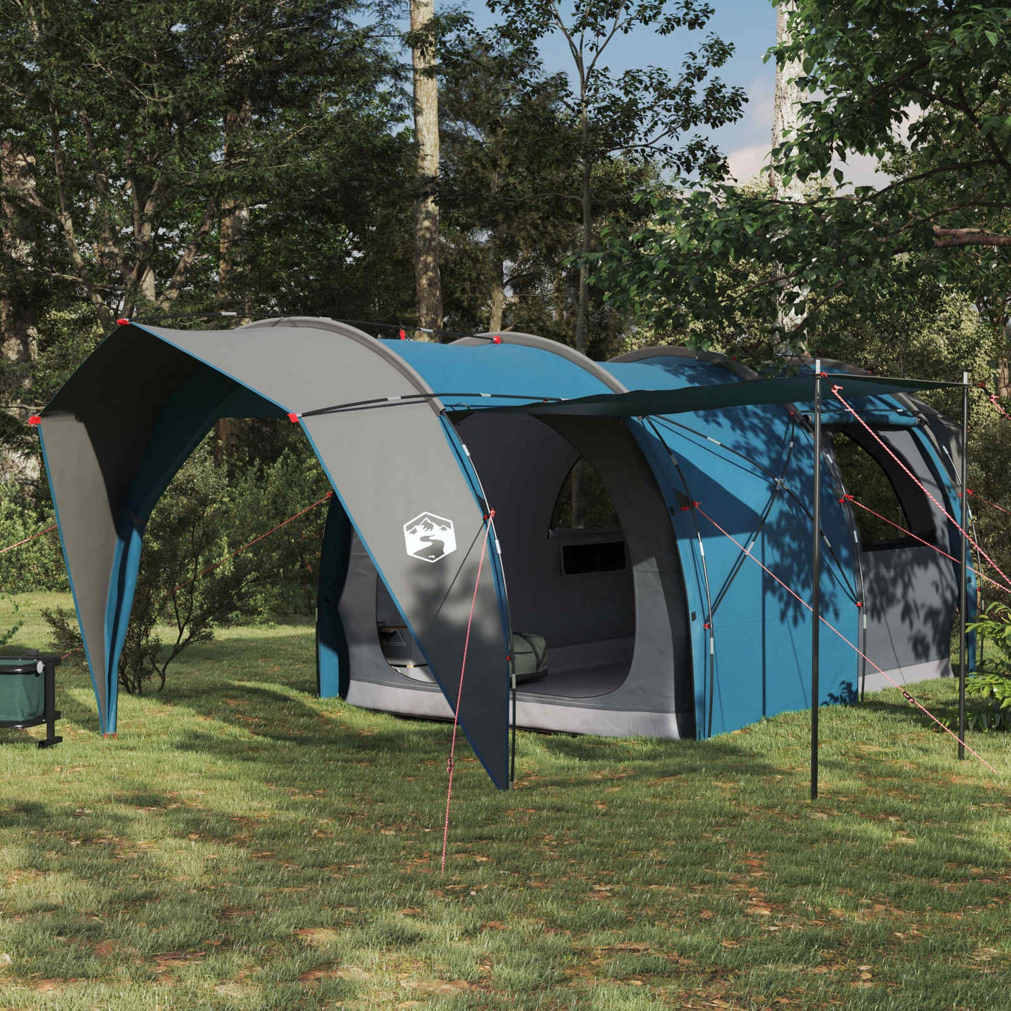 vidaXL tunneltent in blauw, met modern ontwerp en weerbestendige eigenschappen, geplaatst in een groene omgeving.